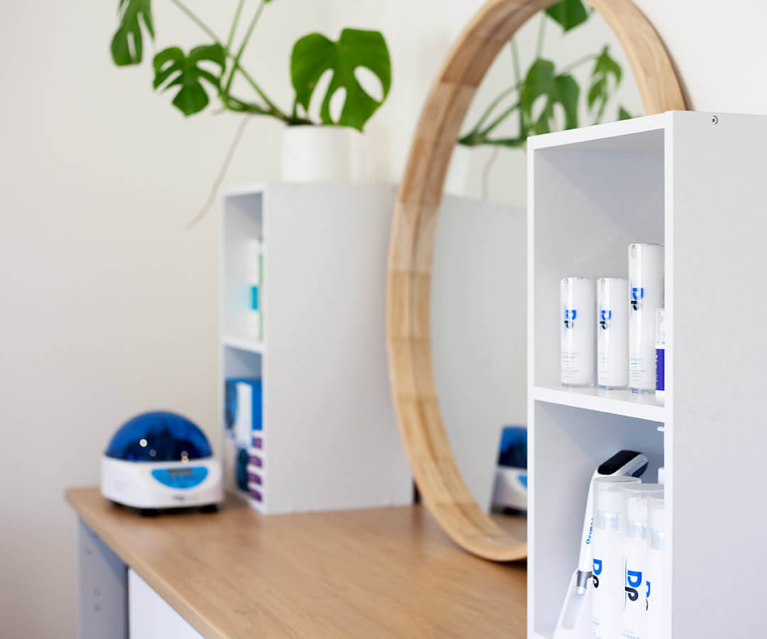 Products and plants lining the walls at the clinic for Dr Katey Cosmetics in the Yarra valley.